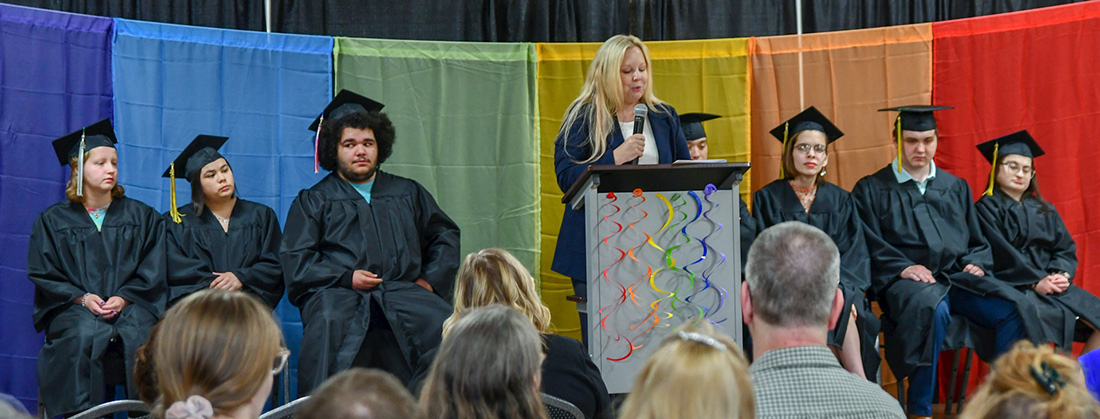DWD Secretary-designee Amy Pechacek, center, speaks at a Project SEARCH graduation on May 18 at the Central Wisconsin Convention & Expo Center in Rothschild. 