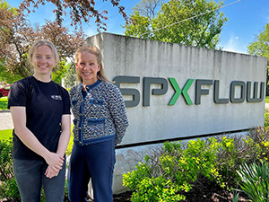 DWD Assistant Deputy Secretary Jennifer Sereno (right) toured SPX FLOW during National Youth Apprenticeship Week and met Zoe Zielinski (left), welding apprentice at SPX FLOW.