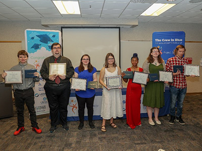 Project SEARCH graduates at Ascension Mercy Hospital proudly show off their diplomas and graduation certificates on May 24, 2024. 